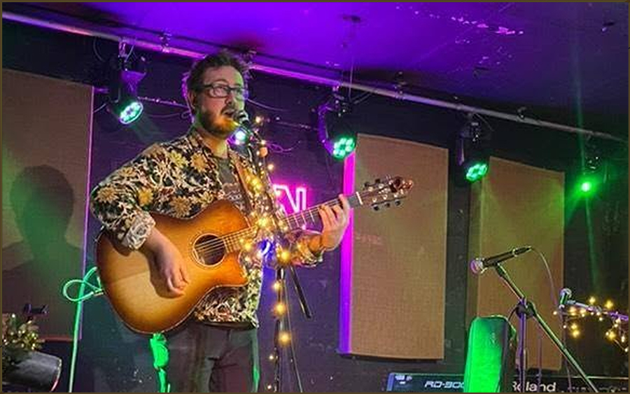 Gary Davies playing live acoustic music in a Stoke-on-Trent venue